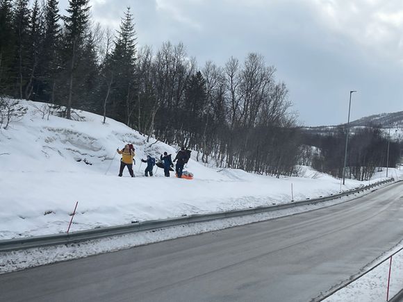 Family snowshoeing to somewhere 