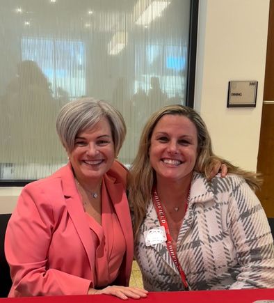 An advisee and me presenting at a wellness event 


