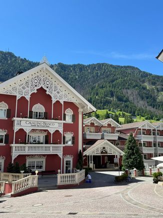 the alpine village of Ortisei - a popular place to stay - in the heart of the Dolomites