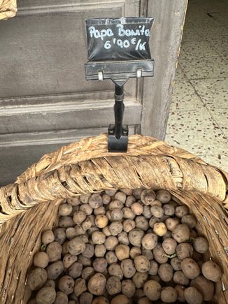 Stopped on route at a shop patronized by locals, and filled with many typical Canarian products, from several types of potatoes including those used to make the famous "wrinkled potatoes" of the islands, served with red and green mojos (salsas)
