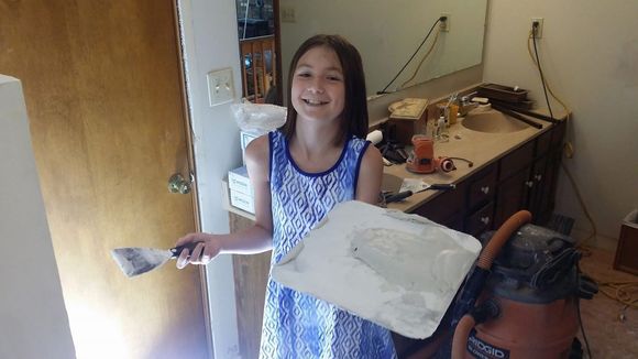 Very young fussy eater learning how to dry wall. Photo from 2017