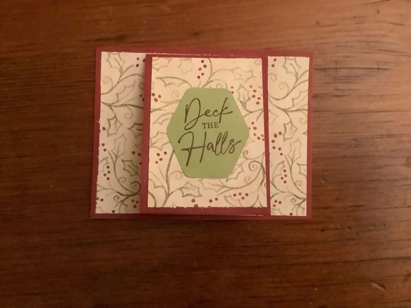 This holds a gift card and fits in an A2 envelope. I should have put a photo showing flap open with section to hold gift card. About four people notched the gift card pocket onmthe wrong side so I had to cut more rectangles in class.
