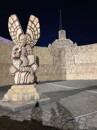 Back of the monument.  There is the classic eagle eating the snake on a cactus.  You may the story of the Mexicas on the move and the myth that when they saw an eagle eating a snake, they were home.  Tenochtitlan, which became Mexico City