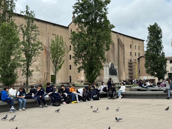 These school children were having a lunch break in front of the Palazzo della Pilotta which houses 2 museums and the Teatro Farnese. We saw many, many school groups on field trips throughout our trip. Oftentimes the children were all wearing matching hats so the chaperones wouldn't lose them. 