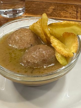 Delectable meatballs made from chicken...with good potatoes in lovely gravy.....