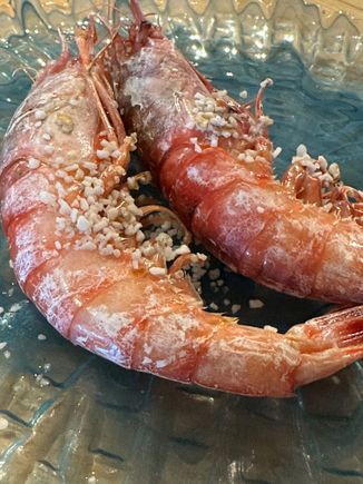 A pair of "alistado" prawns from Huelva, source of some of Europe's most adored shrimp.  Spanish restaurants usually leave the head on, for it contains much of the taste.  Wipes and water with lemon are offered to clean your fingers.  The meat of these was incredibly sweet.  No comparison to most shrimp I've tasted in the US, even in Louisiana.