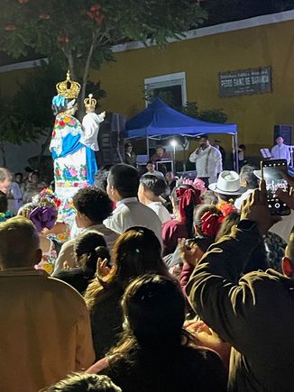 And here's the lady herself, La Candelaria.  The brought her in, twice around the dance floor then back to the church.