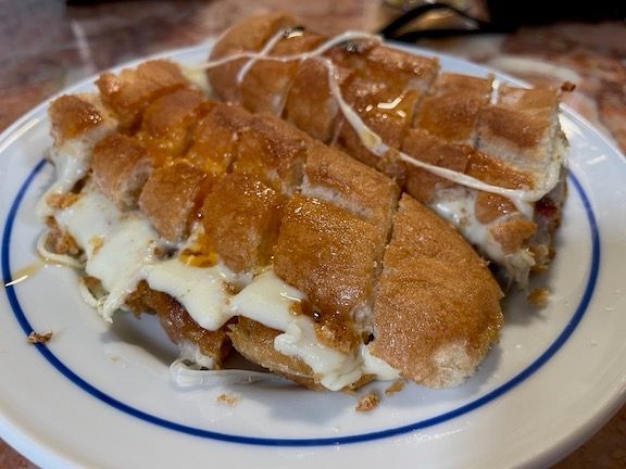 Porto is known for its famous Francesinha sandwich, an egg/cheese/meat affair that made our cholesterol levels go up just thinking about. We never did try it, but we did share a Cachorrinho sandwich, AKA “little hotdog.” I don’t feel like we missed out.