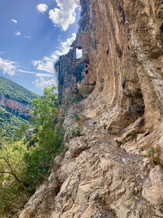 The ruins of Old Philosophou, founded in AD960, a few frescos still visible in the old church