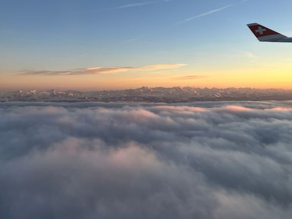 Soon after takeoff from Zurich; love seeing the Alps peeking above the clouds
