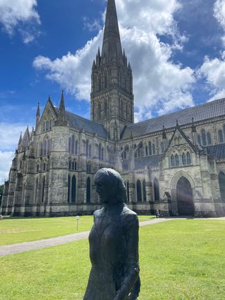Establishing shot of the Cathedral with statue of Elisabeth Frink. Look at those blue skies.
