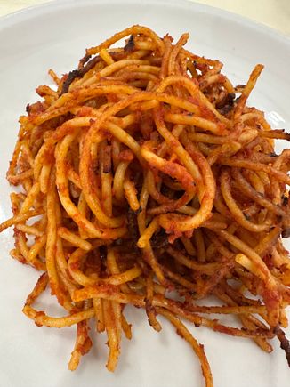 Here it is:  The legendary spaghetti all'assassinata..this is a HALF order and I could barely finish it,  after the antipasti