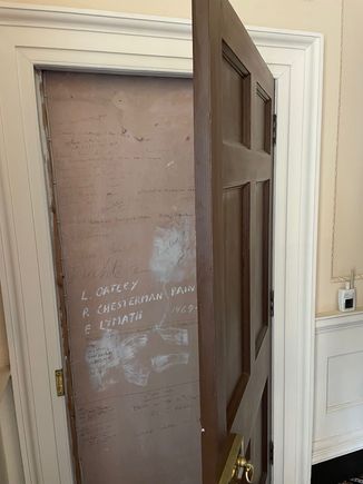 Everything has to be balanced in this architecture, even if it meant adding a door with nothing behind it.  It was needed to balance the door on the other side.