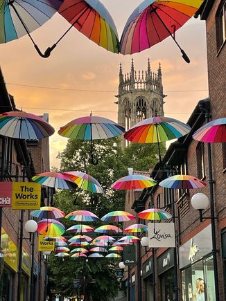 Just a random street scene with umbrellas
