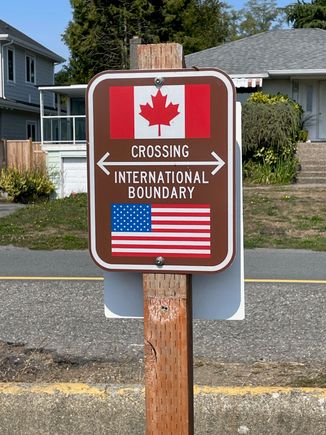 Canada is right across the street from this sign.  We were waving at people walking and driving by.  We could have walked right into Canada, but there was a Border Patrol directly in back of us in a Jeep looking at the boundry to make sure people didn't cross.