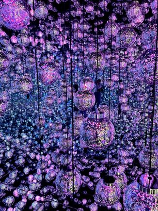 The "bubbles" will change color and pattern as you move your body and hands around them.