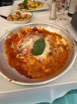 Ed had lasagna. He liked it but it was prepared very differently from what he expected. 