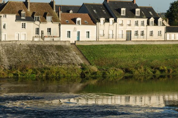 Houses reflected on the Loire. 