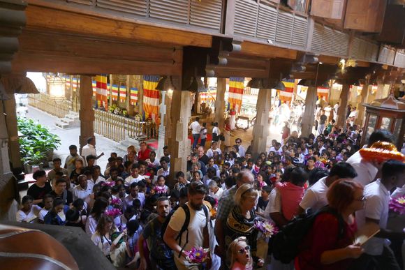 And there are a lot of people! Going from the lower floor to the upper floor where the actual Sacred Tooth shrine is located