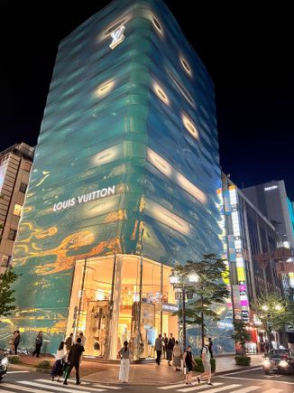 The Louis Vuitton building at night. 