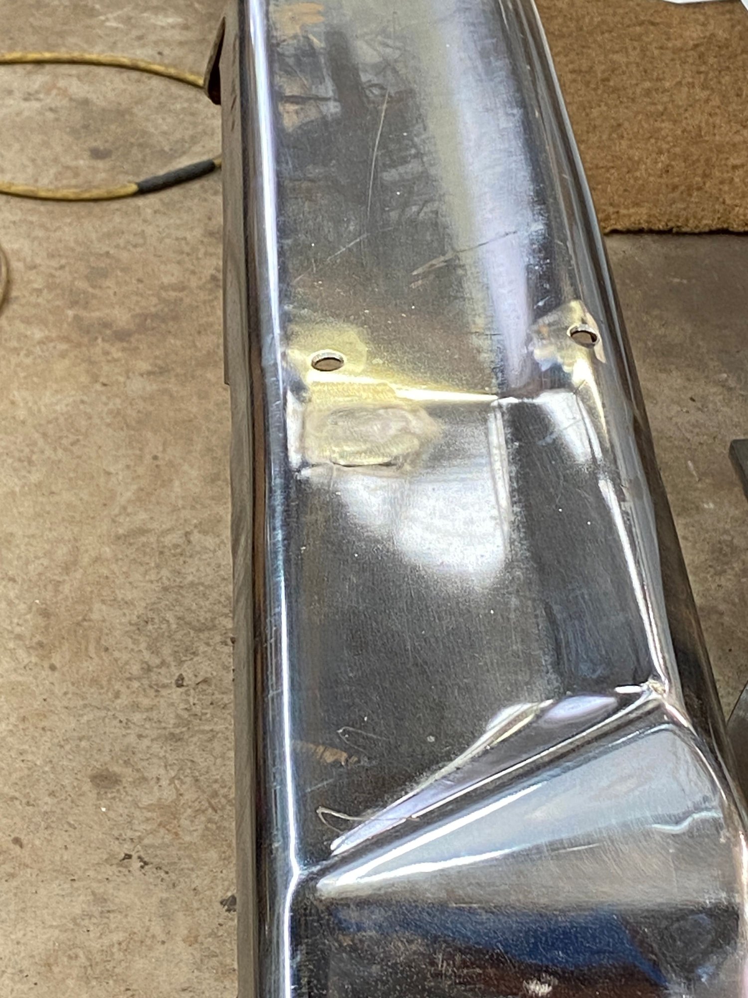 Crease left straightening on press. 