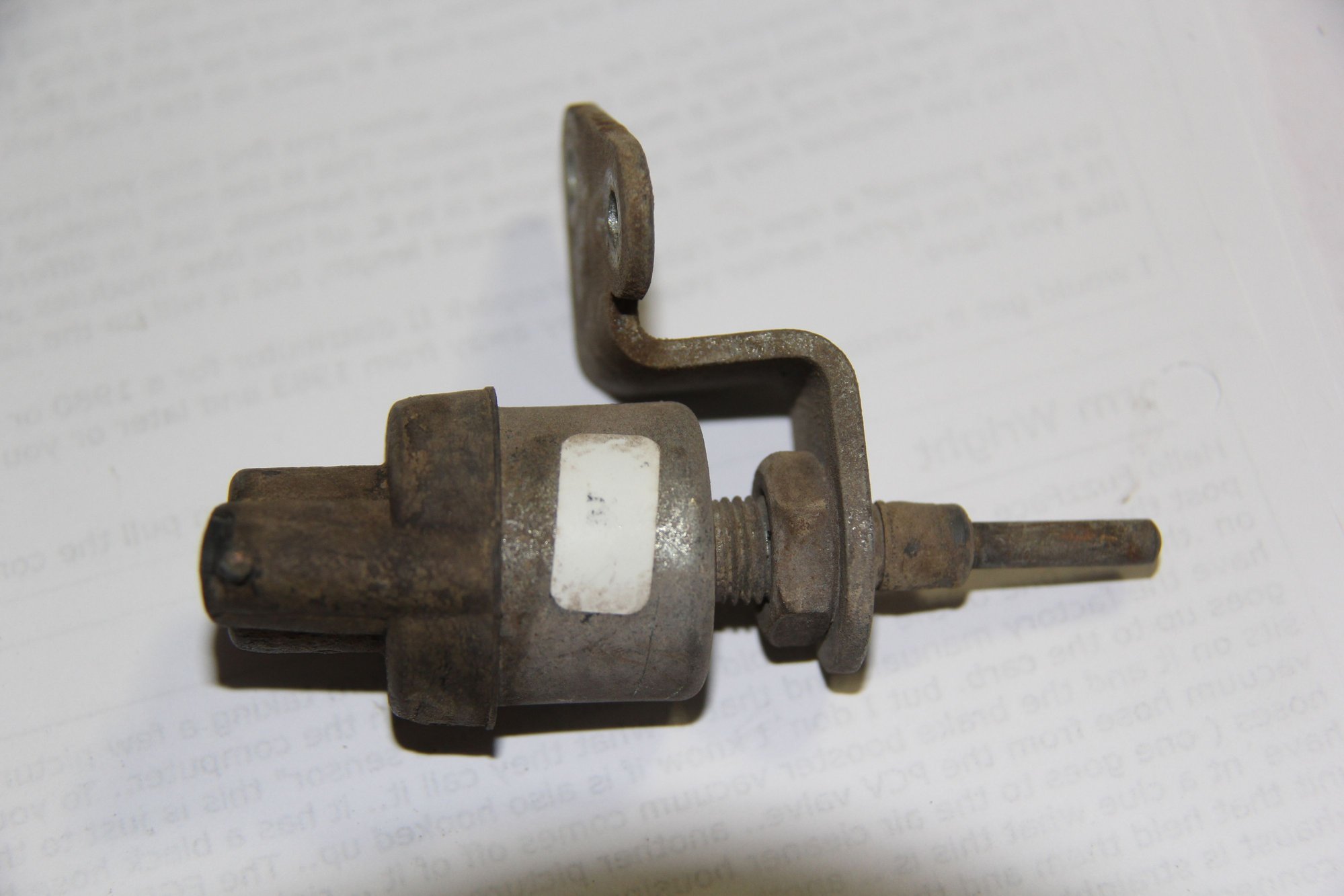  This  is  the  other  one  that bumps  up  against  the  fuel bowl vent lever.