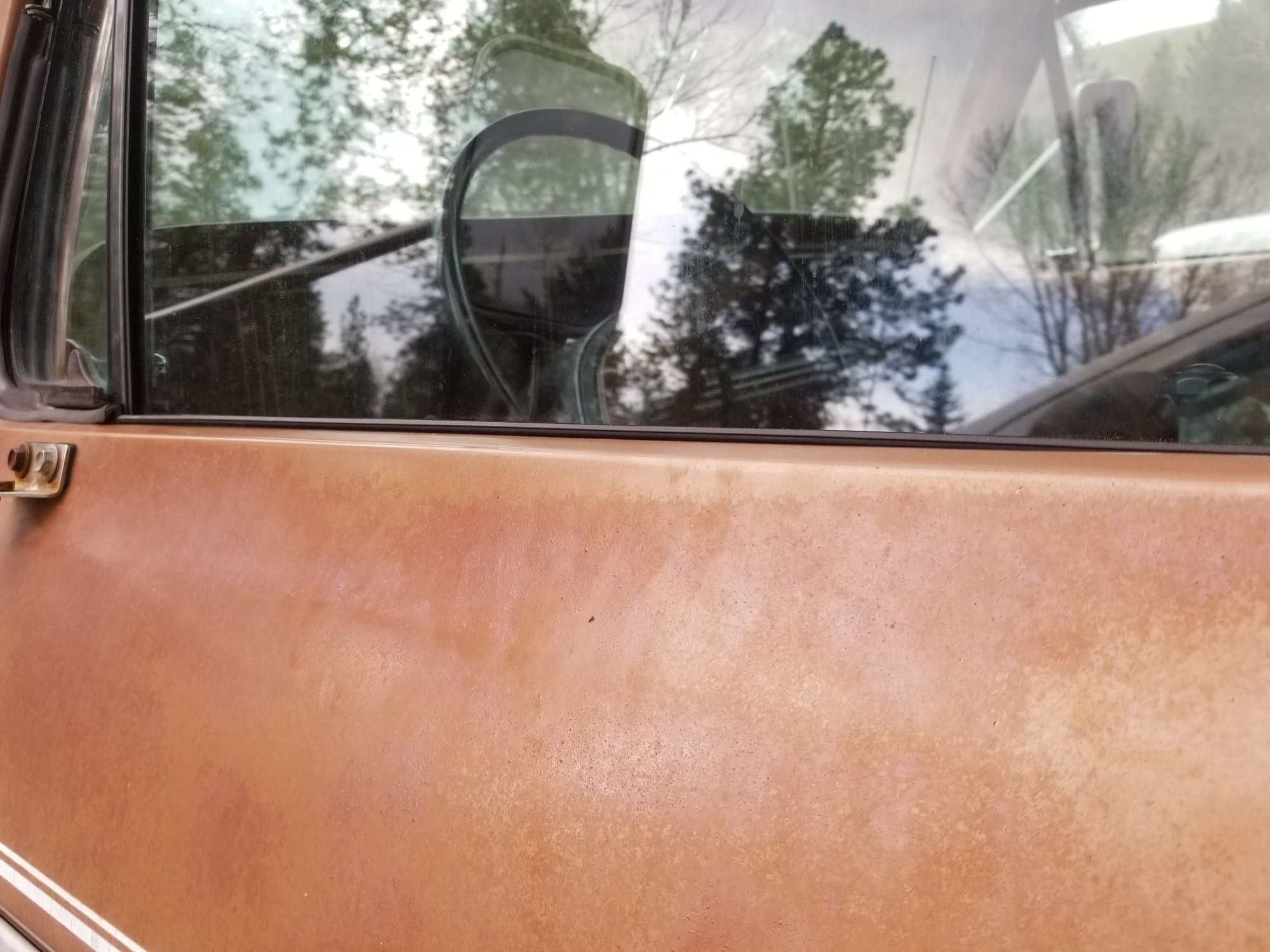 The gap does not close even with the window up and it is not flush with the top of the door. Lame