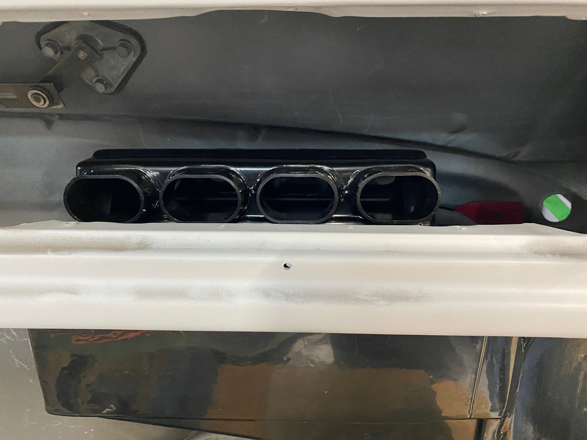 Ducts below wiper arm but really close to the dash, hitting firewall/trans tunnel