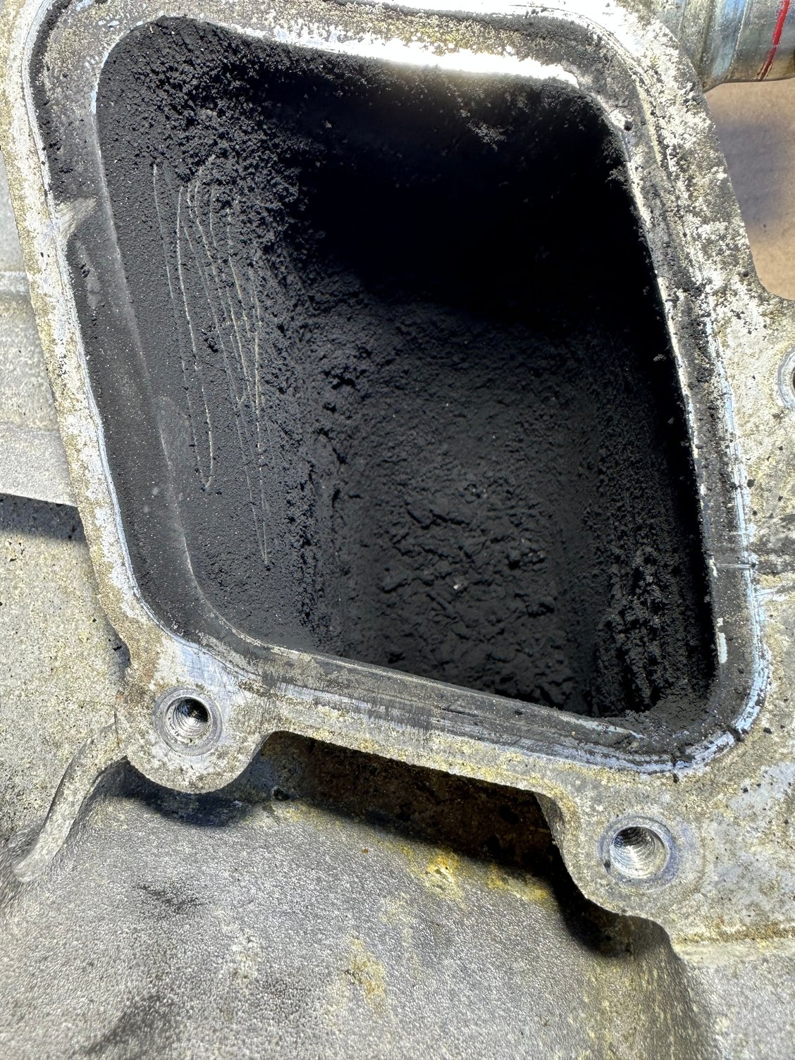 Cleaned ~30k miles ago when installing DPK.