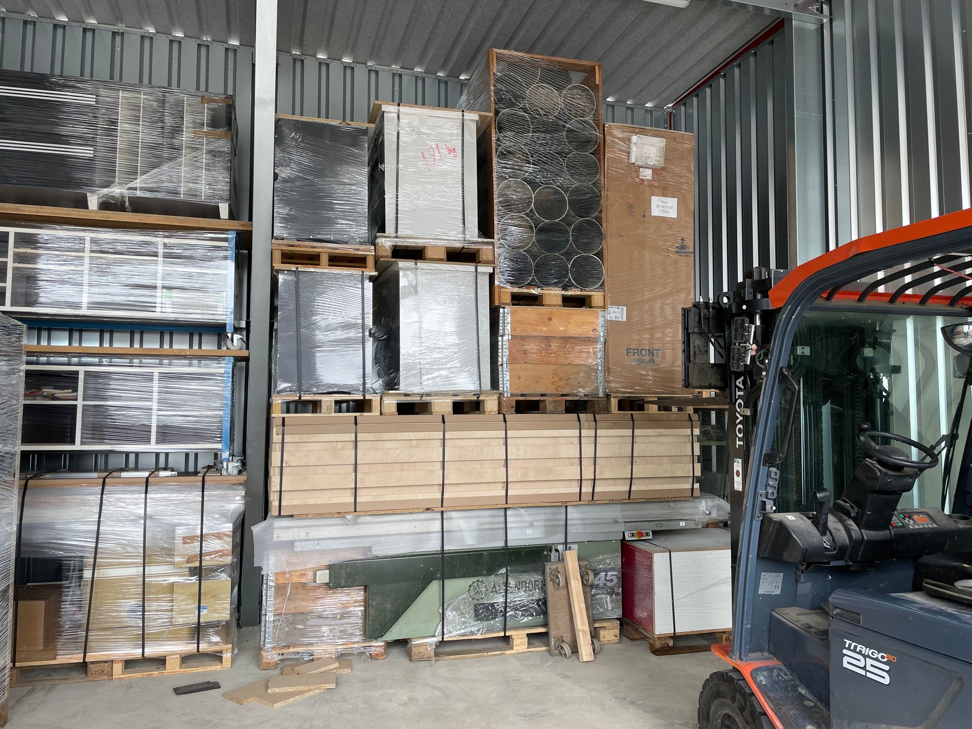 This last photo shows my Altendorf sliding table saw at the bottom of the stack on the right, and my American made Powermatic 72 table saw on the left.  