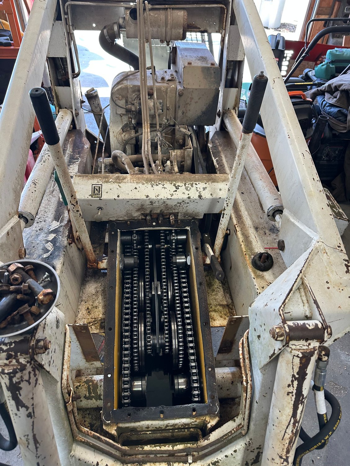 Chain case in the bobcat. All of it comes out. 