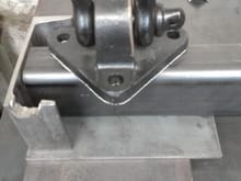 From top to bottom and left to right.The d ring and mount, (to the right) frame channal mount, (to the left) cross bar , mount backing plate and  front mount plate. Imagine the d ring and mount on the bottom instead of whats pictured.
