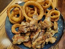 Buttery garlic parmasean wings and a few onion rings. 