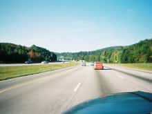 Mark Coleman green extended cab 55' F100.  Richard Vaughn Coral colored chop top suicide door 55'.  Lastly me coming up the rear in my 55'.  Southbound on I-75 between Chattanooga and Atlanta.