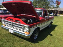 Ford truck fans would all love this red & white F100. Short bed, 351W, air conditioning. Clean as could be!