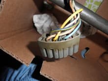To remove the TSS, the wiring harness plug must be disassembled.  Carefully note the location of each wire.  Each wire is removed from its slot by gentle pulling back the plastic tab and sliding out the wire.