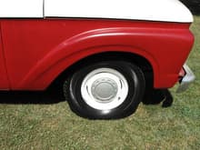 Nice vintage hubcaps, powder coated rims, and brand new Firestones