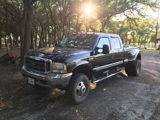 1999 Ford F-350 Super Duty - 1999 F-350 Lifted Dually - Used - VIN 1FTWW33F8XEA63693 - 335 Miles - 8 cyl - 4WD - Manual - Truck - Black - Leander, TX 78641, United States