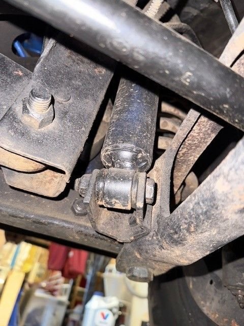Rear shock in the front passenger pair 