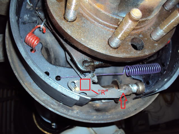You can barely make out the R here, and the spoon edge is bulging out not in.
Source:https://www.ford-trucks.com/forums/1108167-ok-94-f250-rear-brake-diagram-ya-ya-forgot.html
