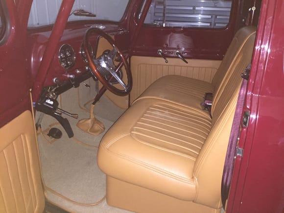 the baby poop brown color isn't represented properly here.  But, the upholstery is done.  The passenger's side is covered with a second skin so I can put my kid's carseats on the bench.  The pleats are just sewn in on the cover.  Pretty good match though!