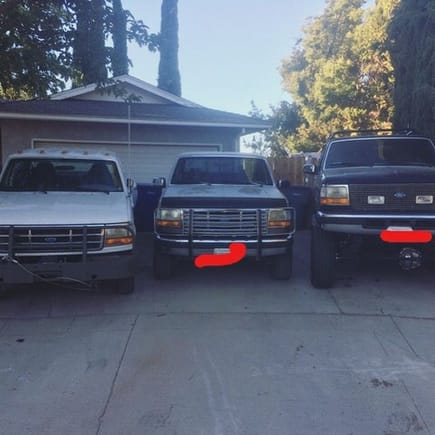 Left is stock hight, before the 4x4 manual conversion.  Far right is 1997 f350 CC LB with 9" lift on 35"x12.5" r17 tires.  The middle truck is my buddies.