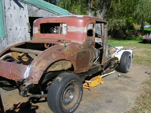 1931 presidents coupe..the interior will be mostly using the jeeps parts...seats, electric windows, rugs, steering wheel, fuel tank, rear sway bar etc etc. basically what ever I can.to keep costs down..