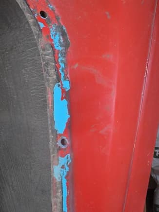 What I thought was the original paint color, present in all the seam joints, but the name plate says color code U. Turns out this blue has no primer under it so maybe the original restoration in the 70s used this for primer.  have not found any original paint anywhere.