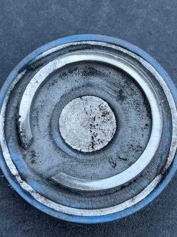 Snap Ring held in place by magnet as I tried to reduce thickness and create flat surface on both edges from a stamped ring.