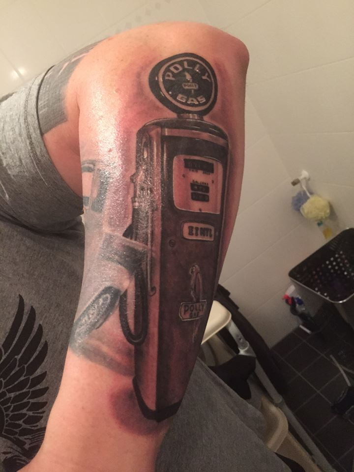 Added this old gas pump to  Toiled Clover Tattoo Parlor  Facebook