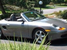 My 2002 Boxster.  My very first Porsche!  Best car I've ever owned. Thrilled. What a great, fun driving machine!