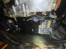 What it looks like when the pan is dropped. the black thing is the CVTF strainer, the rest is the lower valve body.