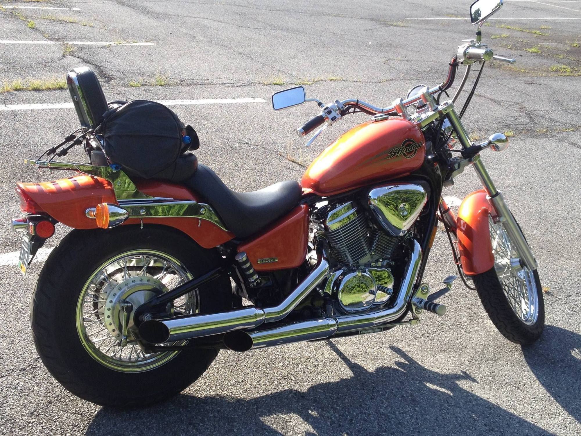 'Orange Crush'  04 Honda VLX.  Last picture I took a month before I found the Dyna.  Just spent $700 on new V&H pipes 9 months prior
