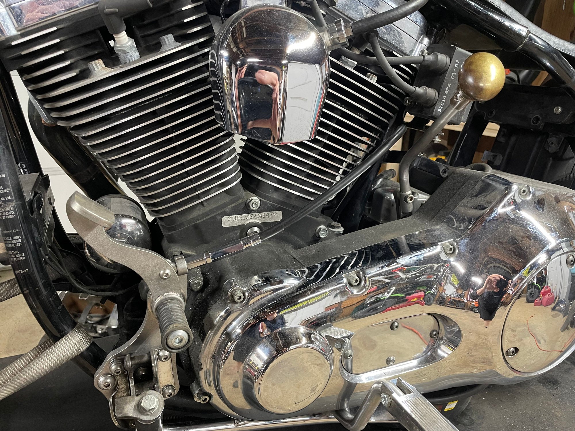 For clutch and hand shifter installed. Found the door **** at an antique store, thought it�d give it a cool look. I�m a sucker for brass, every bike I build I put brass accents on.